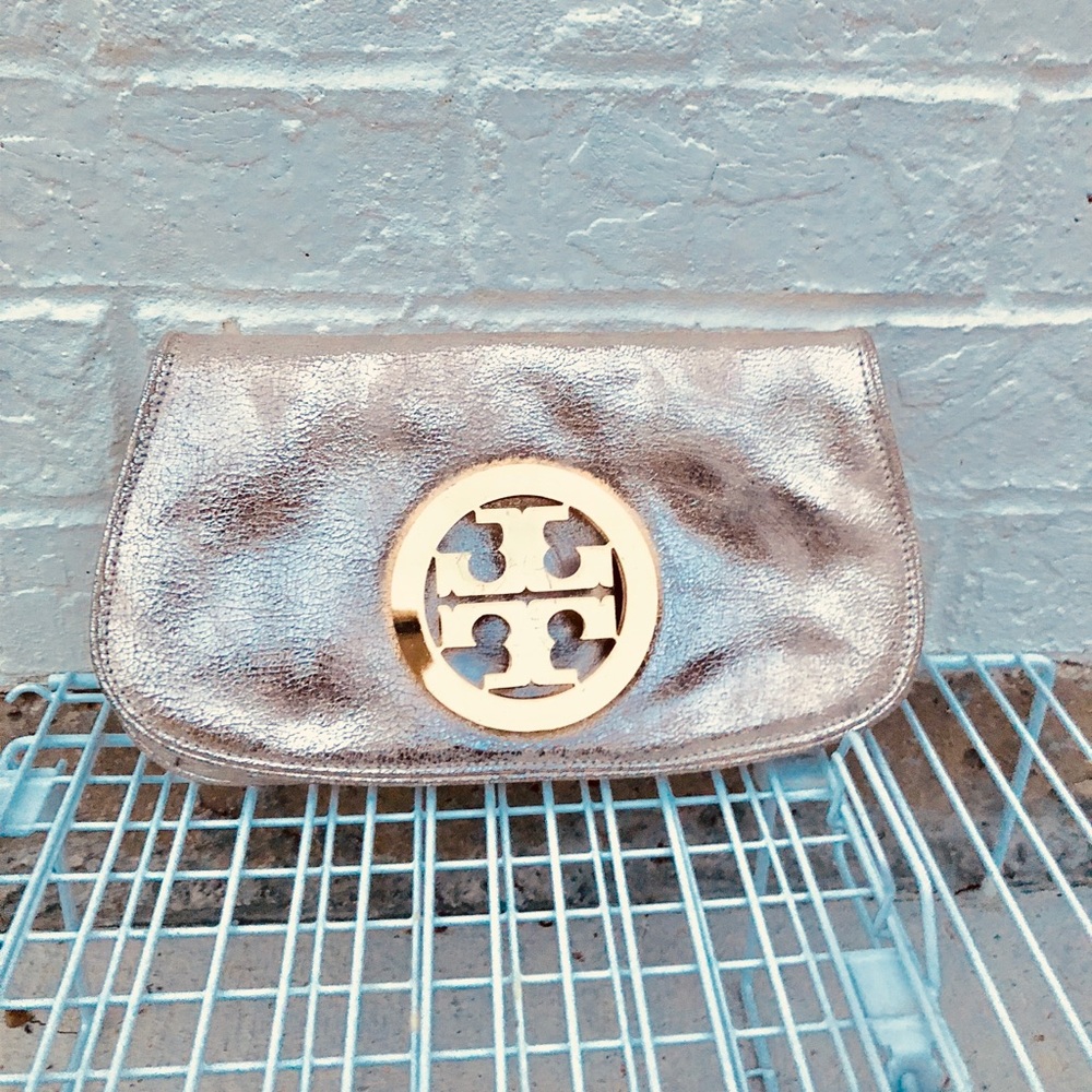 Tory Burch gold clutch bag